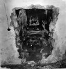 Käärkambri purustatud piscinaniÅ¡Å¡ idaseinas (sondeerimise ajal).. Autor: V.Raam. Aasta: 1984