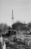Vaade lõunast Ambla kirikule. Fotol on näha, et kiriku tornikiiver on pikihoone poole kaldunud. Autor: V. Vaher. Aasta: 1967. #1