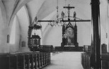 Jõhvi kiriku sisevaade. Vaade altarile ja kantslile. Altaripildiks E. v. Liphart'i maal, mis kujutab Kristuse taevaminemist.. Autor: K. Jaik. Aasta: 1930. #F24671