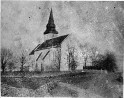 Vana foto Valjala kirikust madalama katusega. Vaade NW-st.. Autor: V.Raam. Aasta: 1984