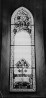 Vitraažaken pikihoone põhjaseinas, klaasimaal, millel all tekst: â€žMina olen wiinapuu ja teie vinapuu oksadâ€œ. Annetatud (1909, Mihkel Ristal).